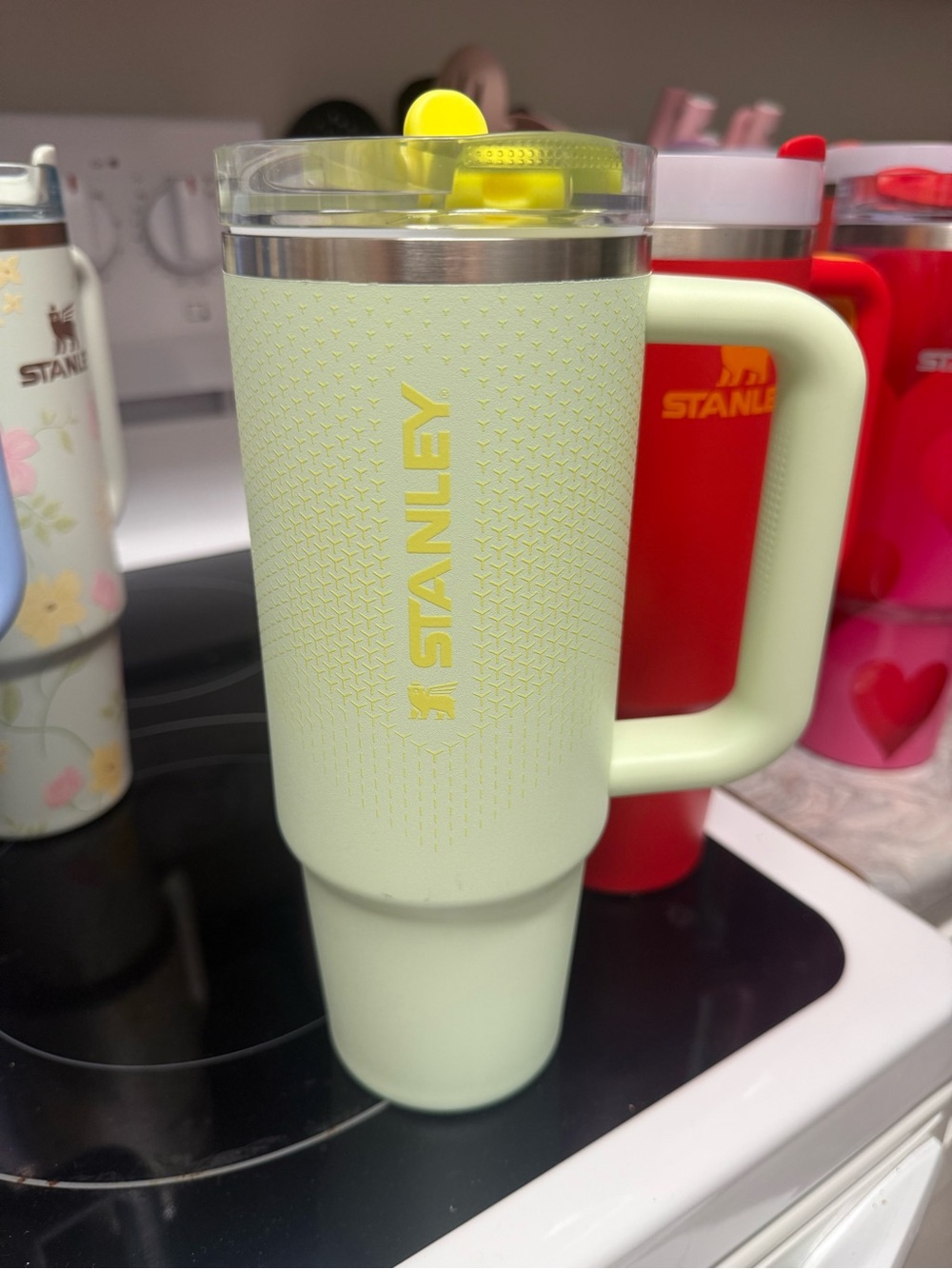 Stanley Pale Green Travel Mug with Yellow Accents